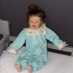 Vintage Porcelain Doll in Blue Outfit